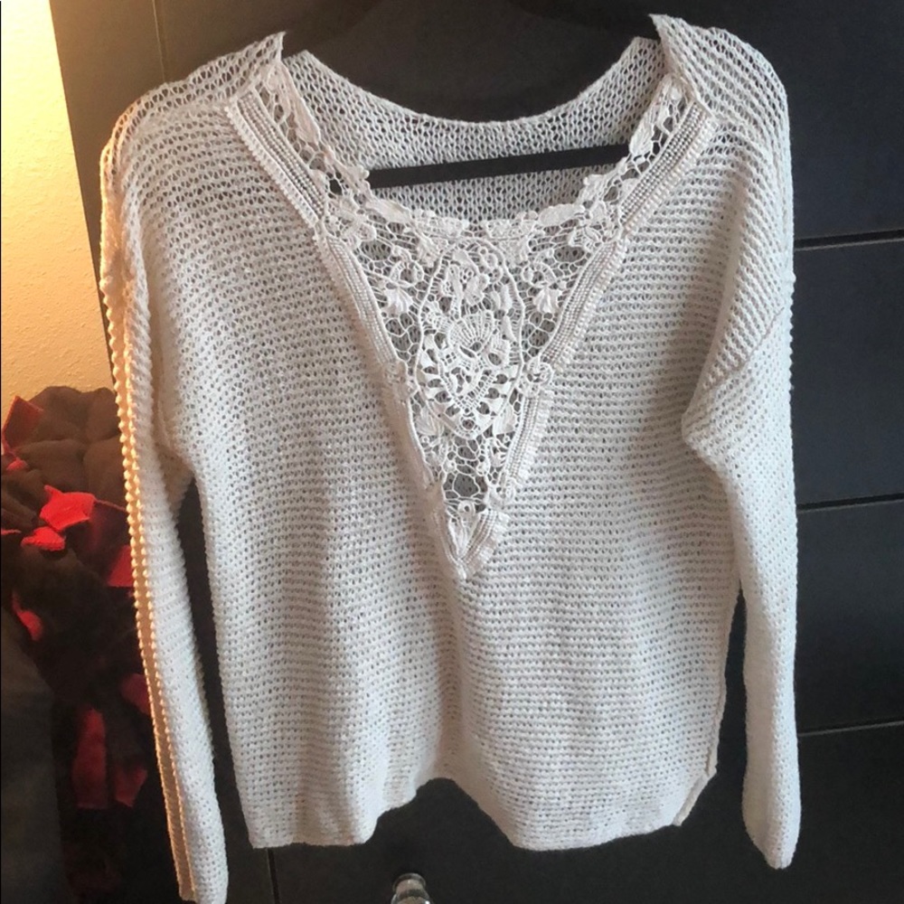 White knitted sweater